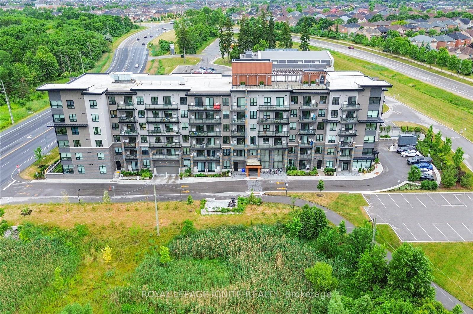 Welcome to 9700 Ninth Line, where style, space, and convenience come together in this beautiful corner unit condo.