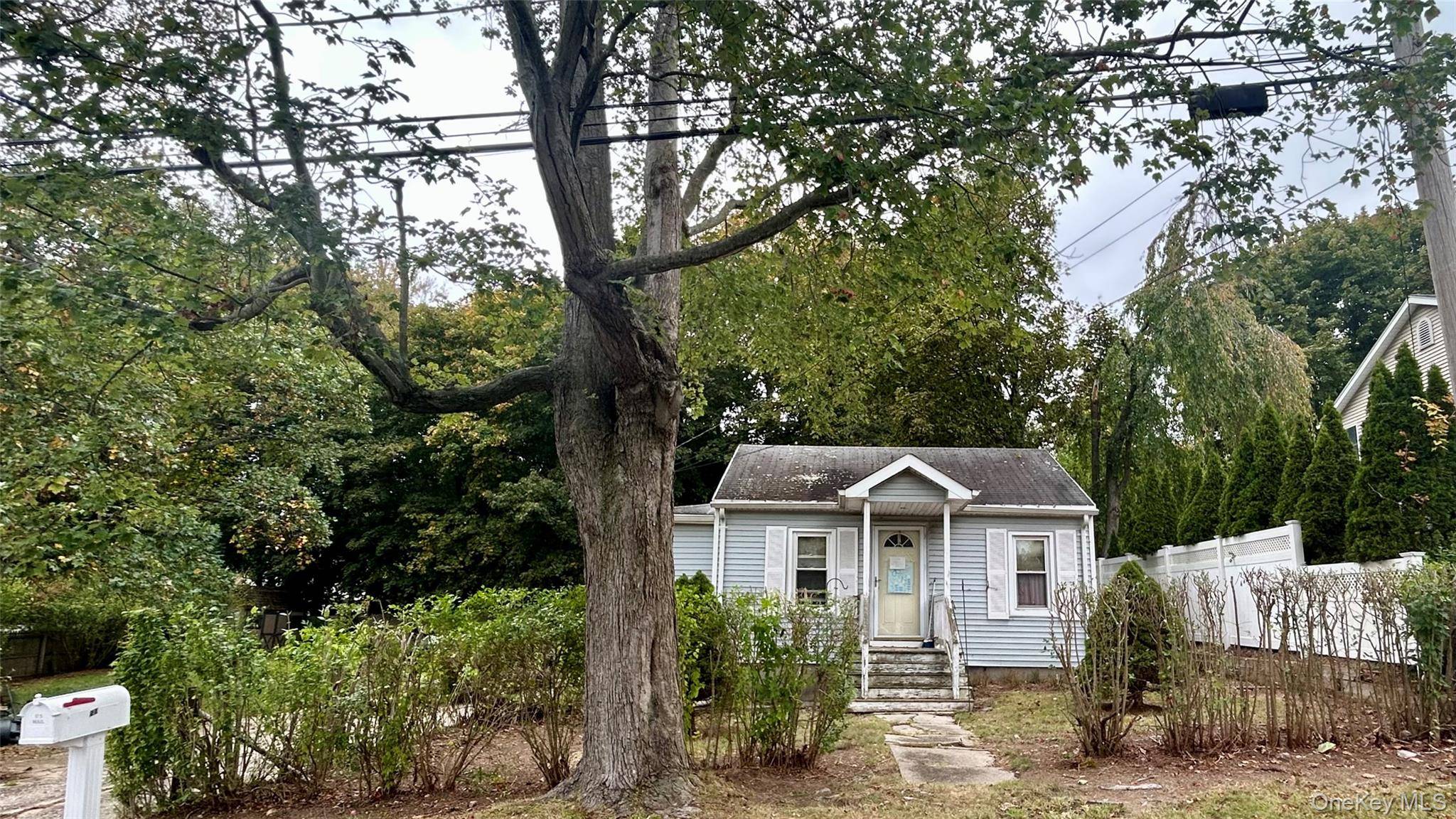 This 4 bedroom, 2 bathroom ranch is set on a beautiful, sprawling piece of land with plenty of room for expansion.