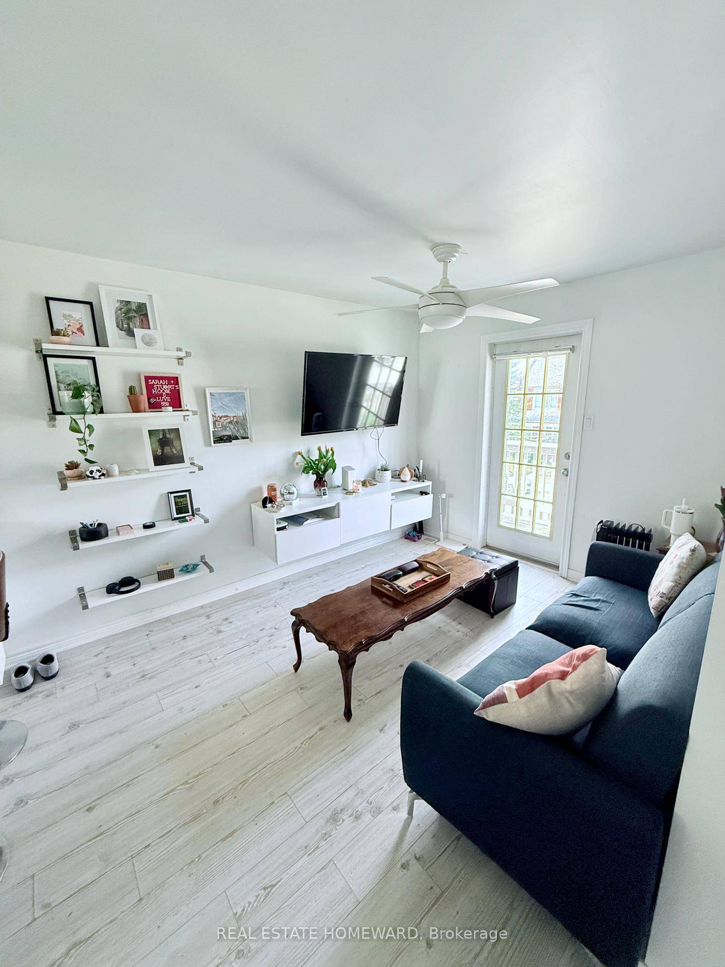 Live in style and comfort in this beautifully updated 1 bedroom suite spanning the second and third floors of a charming home in sought after Dovercourt Village Davenport.