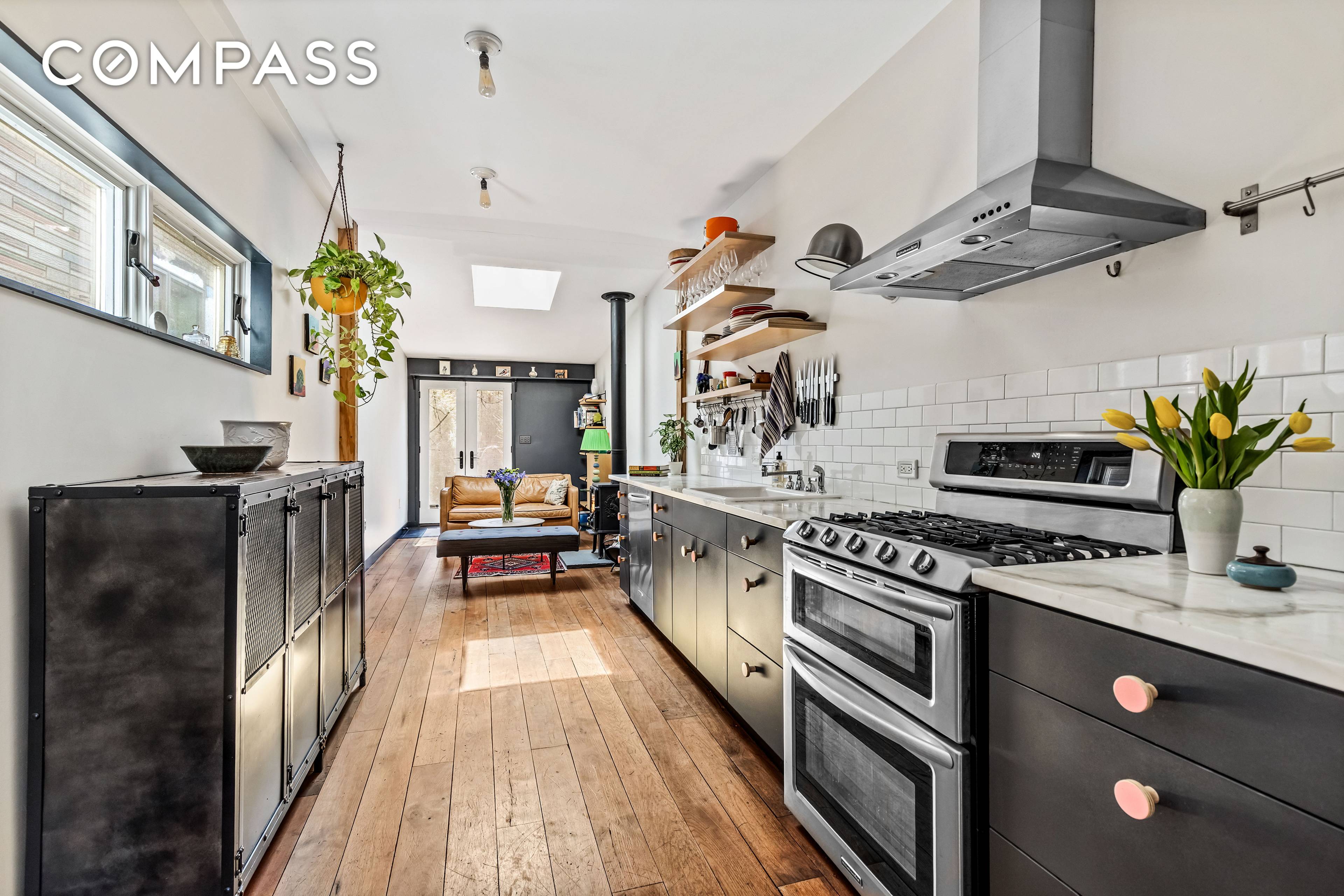 Designed and fully renovated by an architect for her family, this 1600 SF including full basement home is understated but sophisticated, textured and narrative rich.