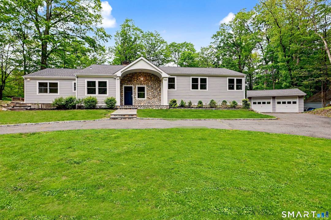 Totally renovated in 2023 Like New Walk into this grand entrance with cathedral ceilings and skylights.