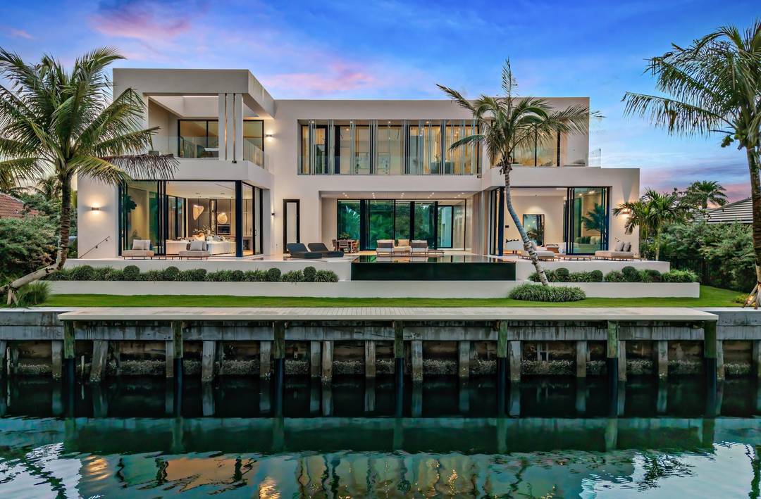 Meticulously designed, 35 Spoonbill Road is a new six bedroom Point Manalapan estate blending museum like minimalism with warm luxury.