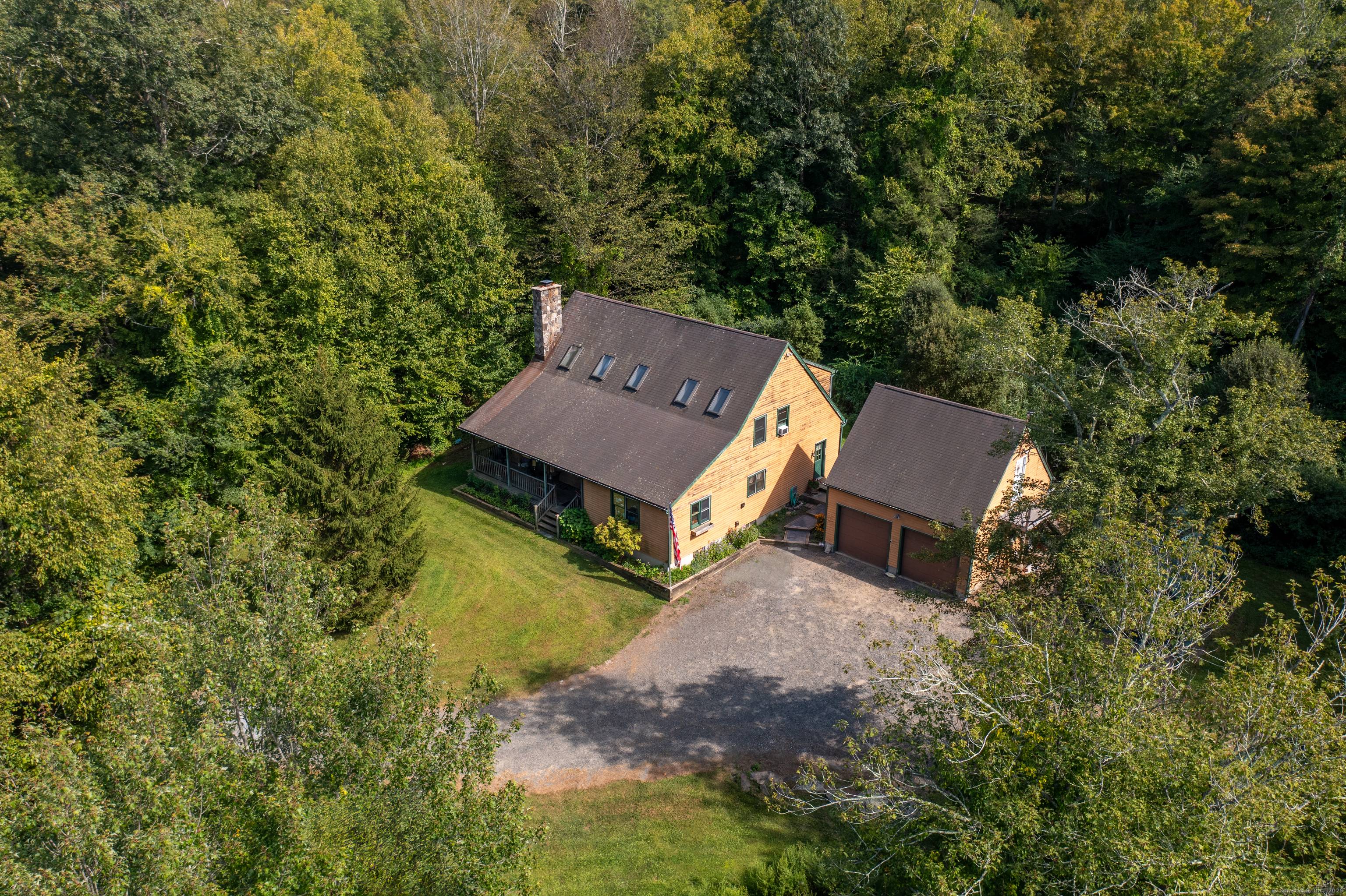 If privacy in the Litchfield Hills is your aspiration, this is the house for you.