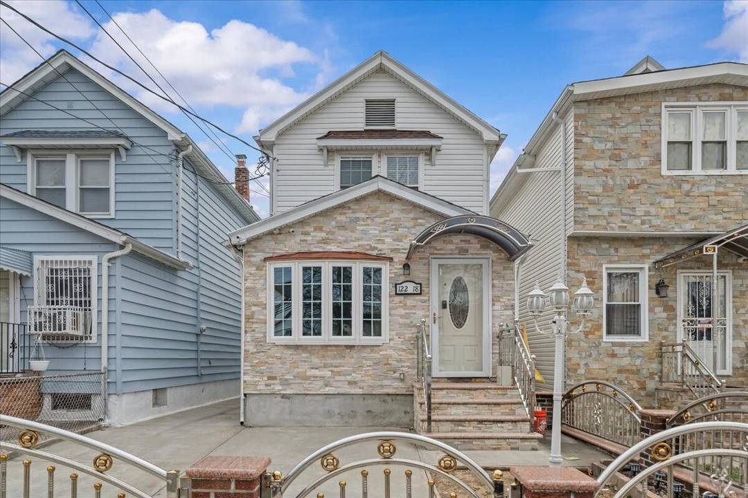 Welcome to this beautifully renovated and meticulously maintained home nestled in the vibrant neighborhood of South Ozone Park.