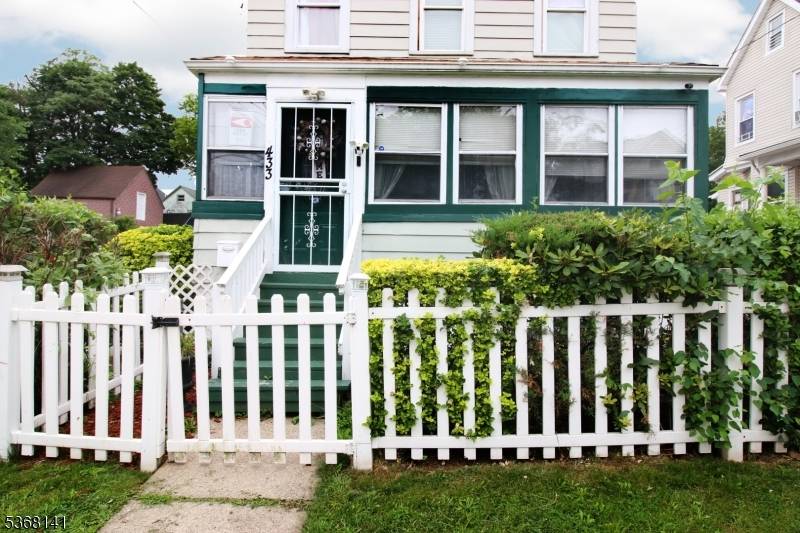 Welcome to a Charming Colonial Style Home Full of Potential !