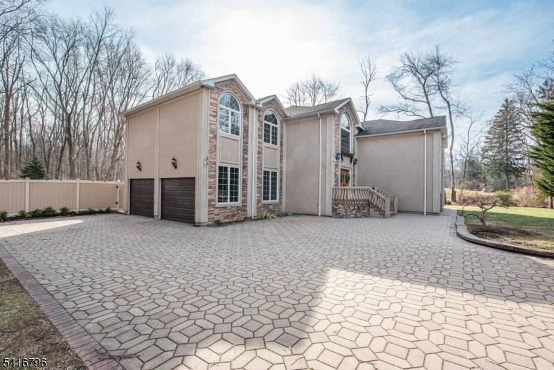 Welcome to this stunning custom built 2006 home offering over 3, 500 sq ft of beautifully designed living space with 4 bedrooms and 4.