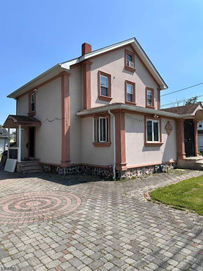 Come see this beautiful, updated colonial home located on a corner lot in the Passaic Park area.