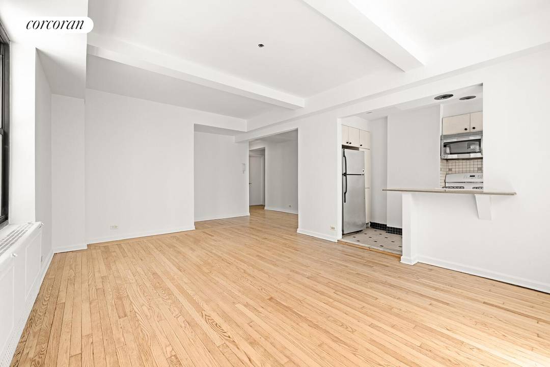 Extra large corner pre war one bedroom with Southern amp ; Western exposures located in a prime Chelsea location !