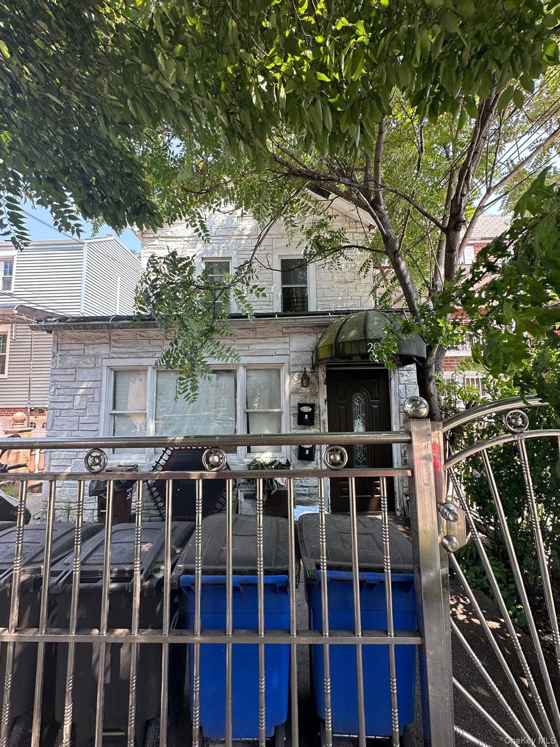 2 family residence with a separate entrance, finished basement in the prime location of Morris Park.