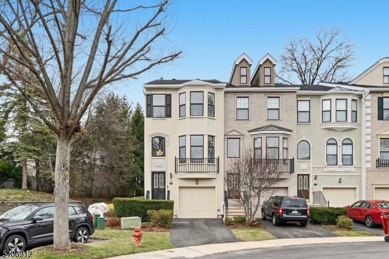 This stunning tri level end unit luxury townhome, located on a cul de sac w a great yard, offers an exceptional blend of modern design and thoughtful renovations throughout.