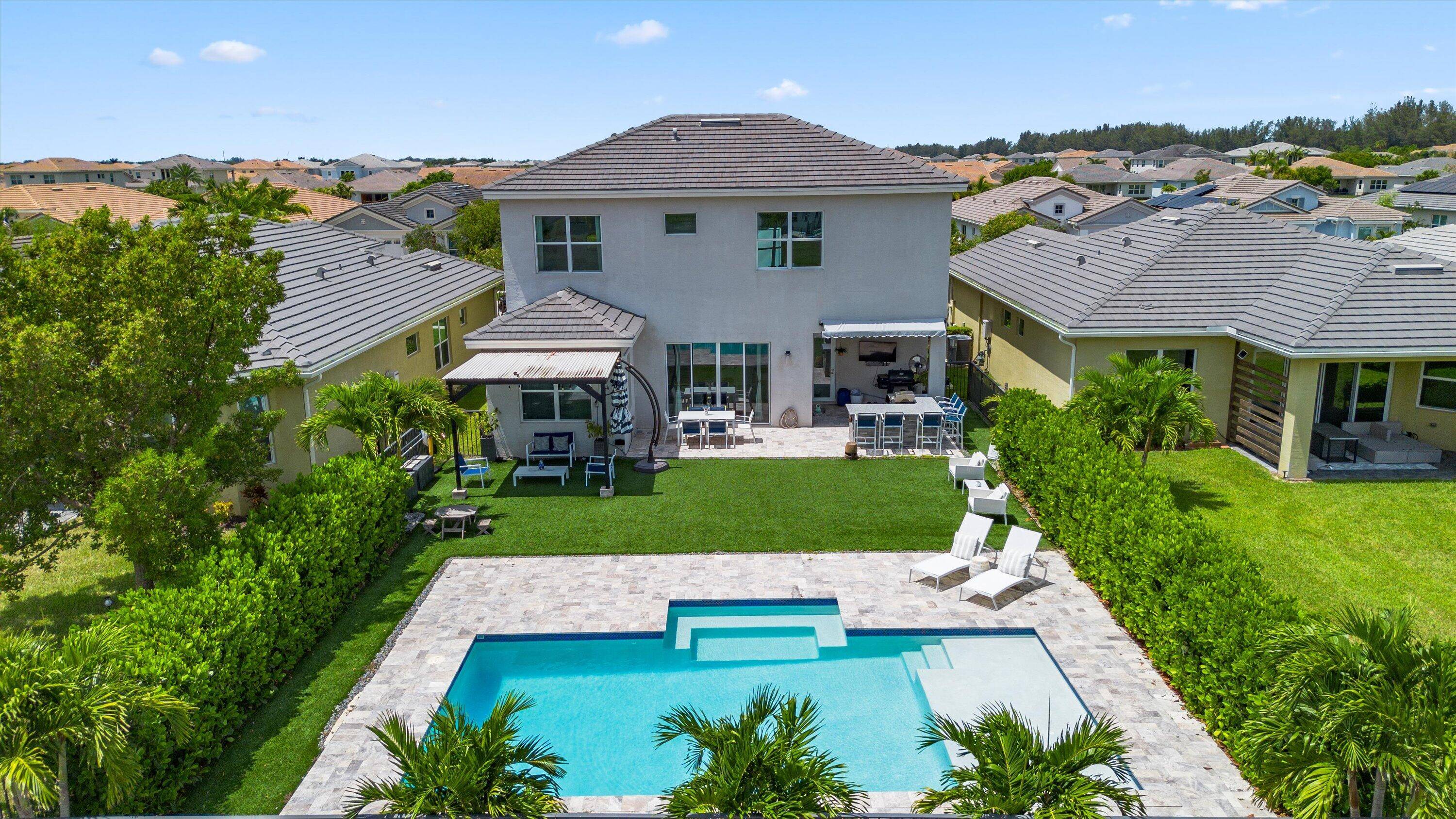 Experience luxury living in this Sycamore Model home, located in the prestigious Meadows community of Westlake, FL.