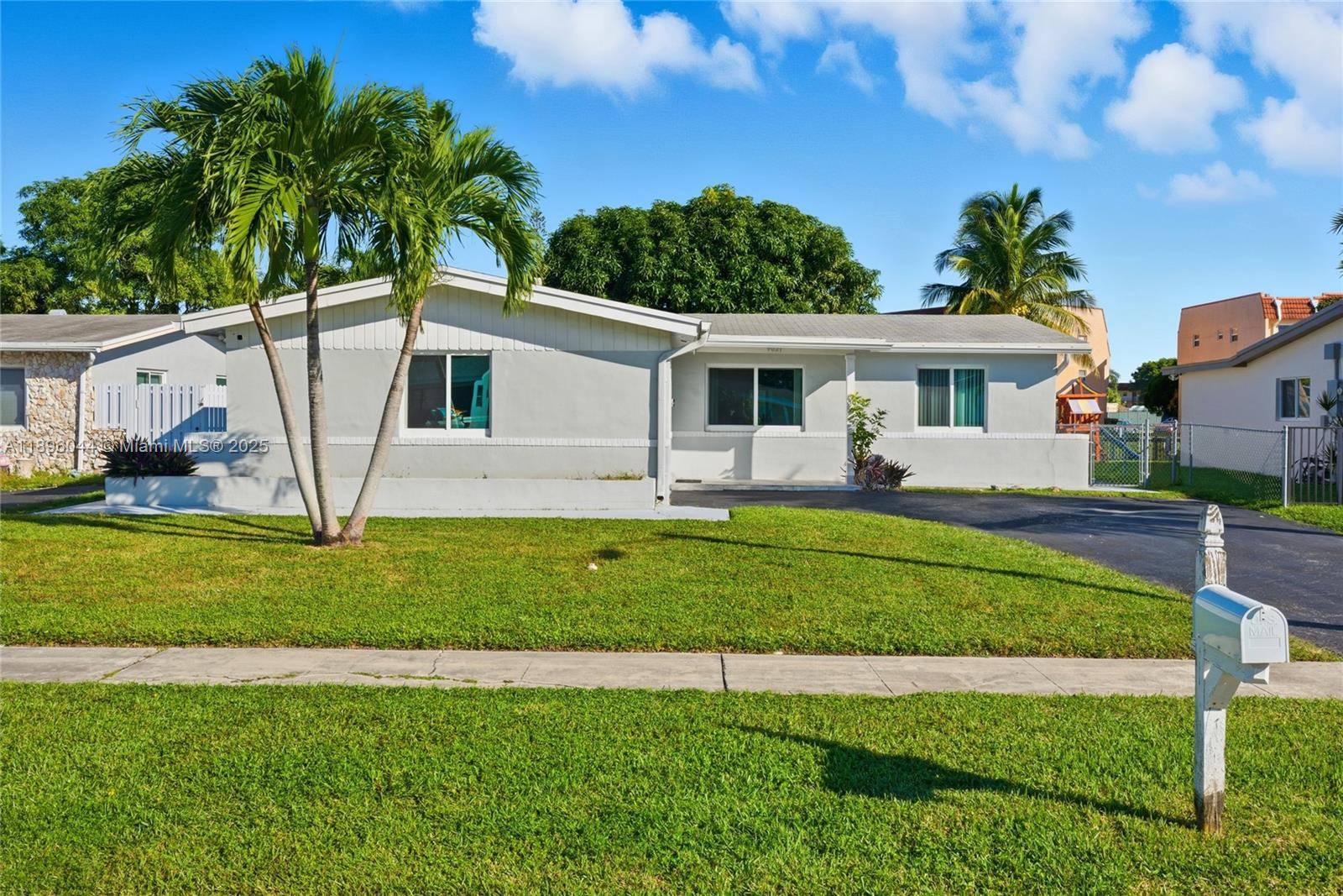 Enjoy peaceful lake views from the main living areas and screened in patio an ideal setting to relax or entertain.