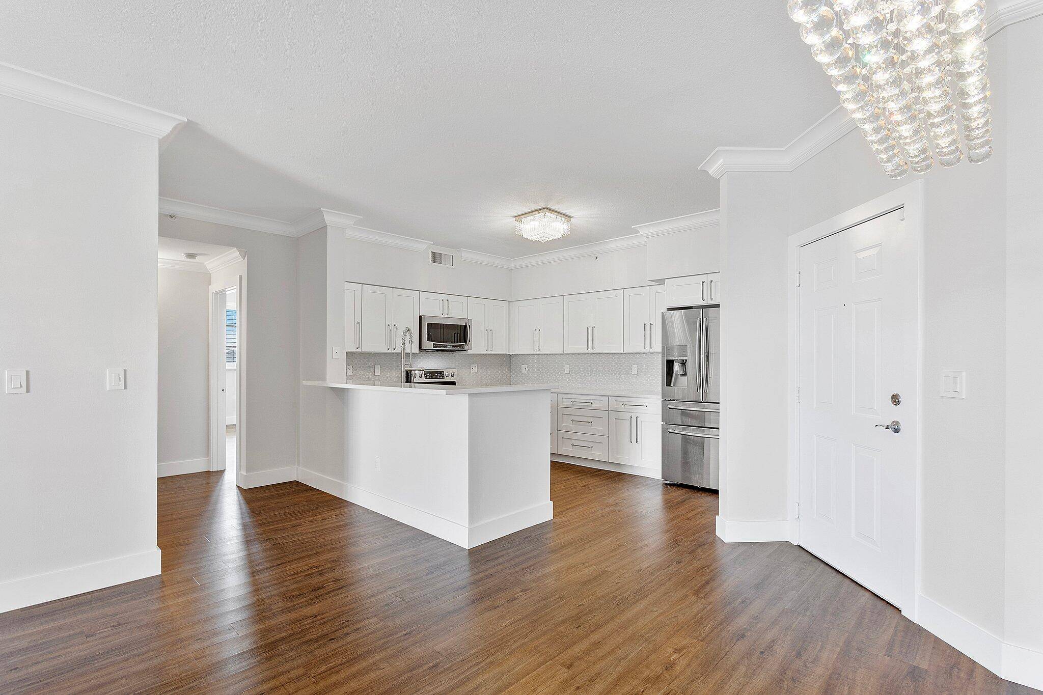 ABSOLUTELY GORGEOUS SE CORNER UNIT !