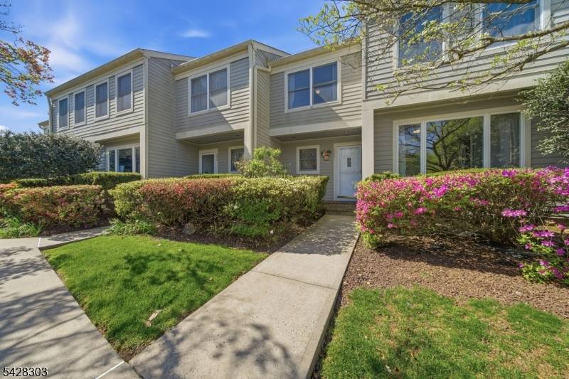 Set against a beautiful rolling landscape overlooking the scenic Princeton Ridge and Van Horne Park, this beautifully updated townhouse offers a rare blend of privacy, views, and community charm.