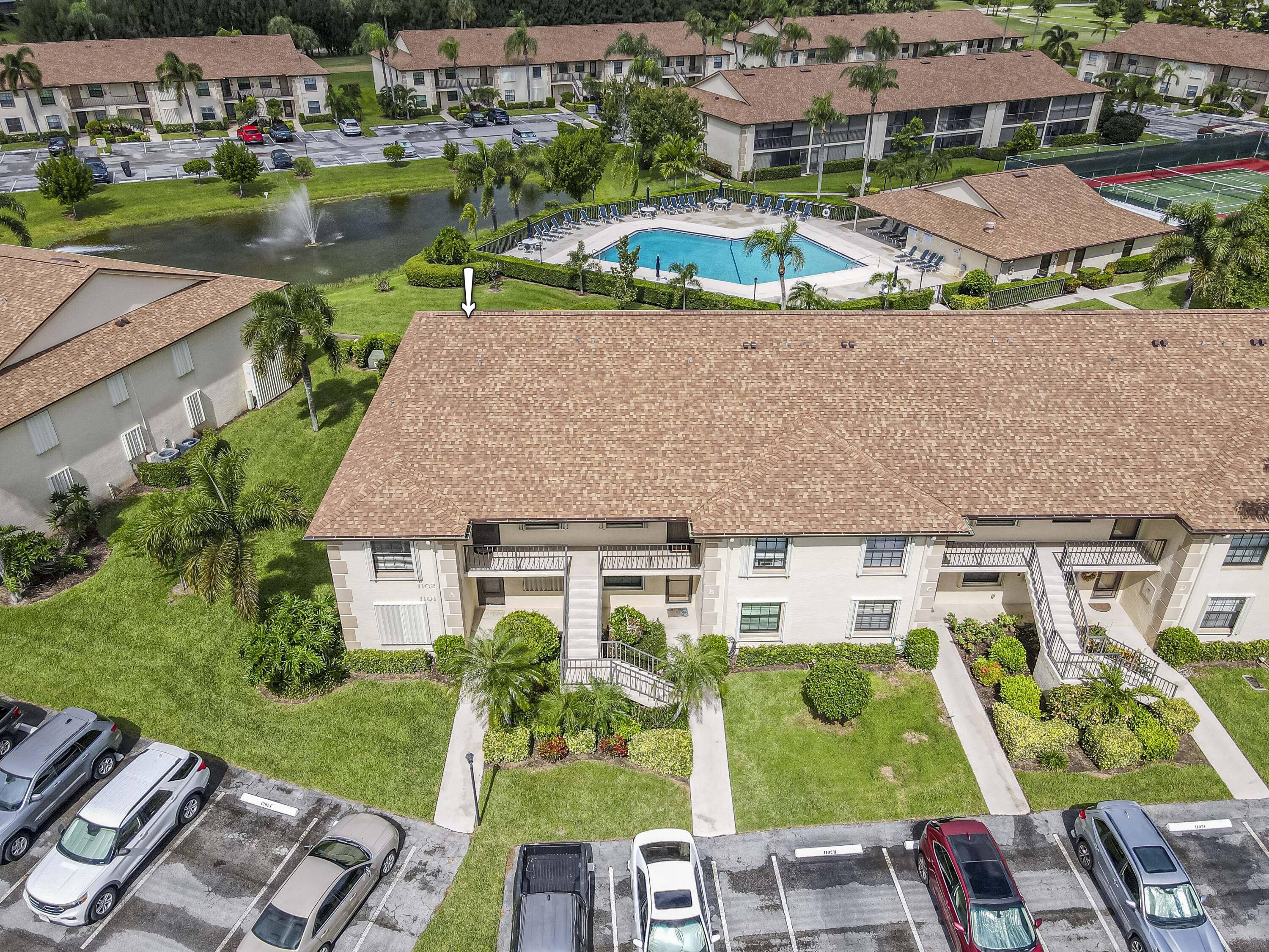 BEAUTIFULLY RENOVATED, TURNKEY, and spacious second floor corner 2 bedroom, 2 bath condo w vaulted ceilings.