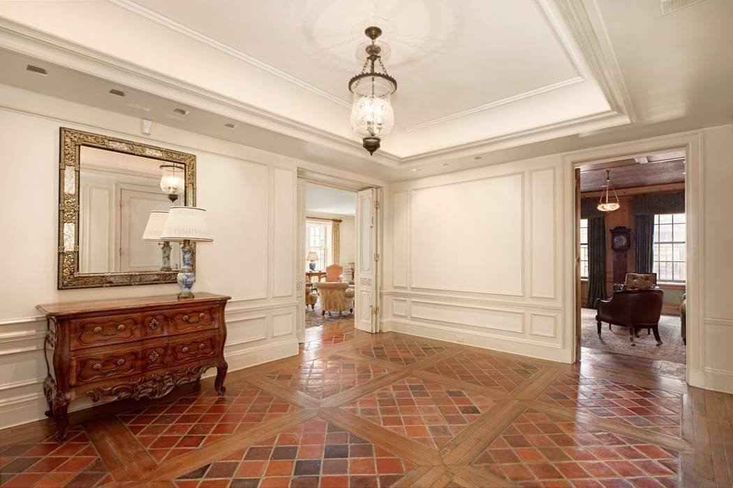 Ideally located on East 71st Street and situated in one of Park Avenue s most esteemed pre war white glove cooperatives, this abundantly bright high floor residence is distinguished by ...