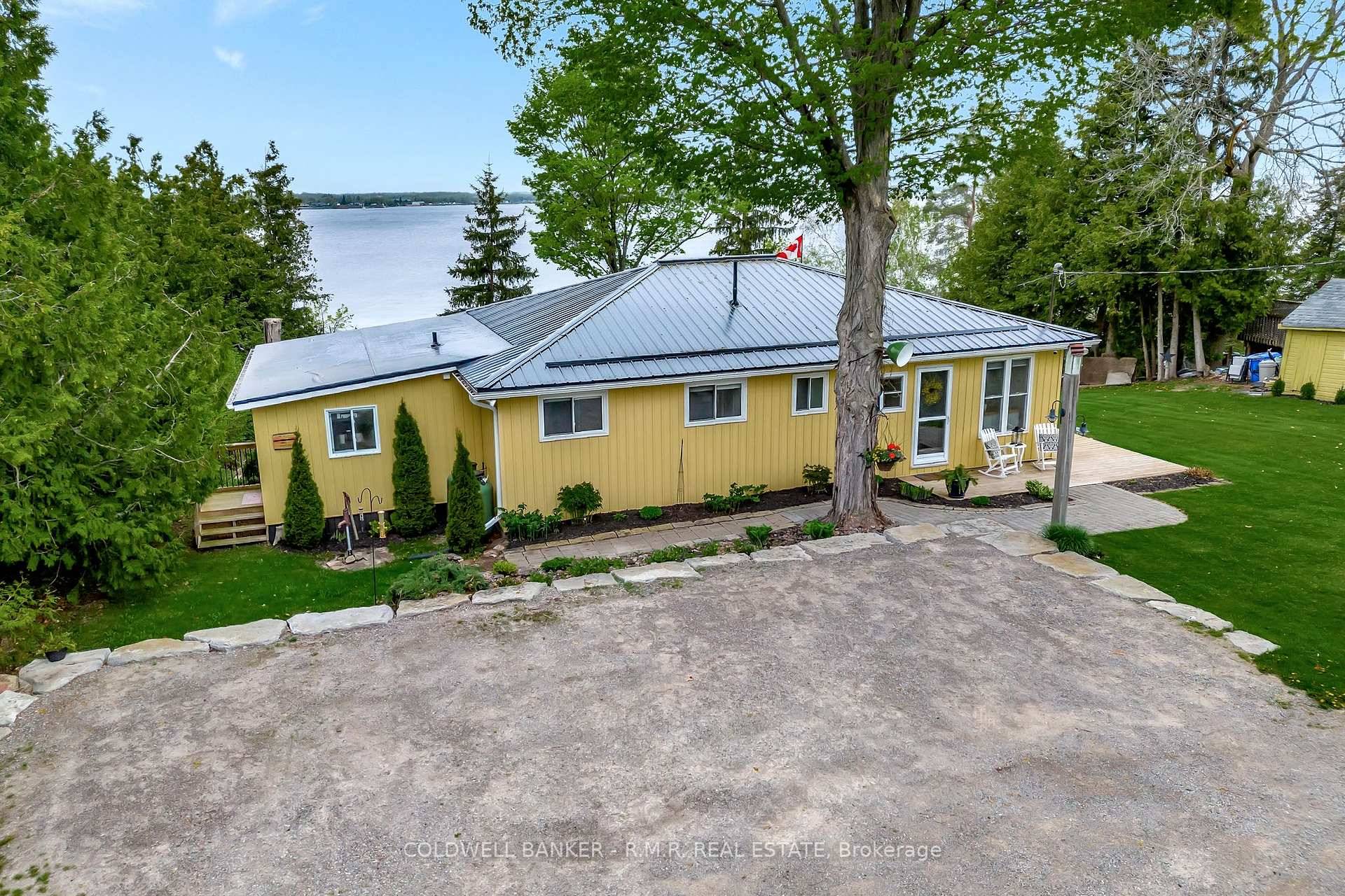 Nestled along the serene south shores of Sturgeon Lake, part of the Trent Severn Waterway, this exceptional four bedroom, three bathroom home offers over 100 feet of prime, west facing ...