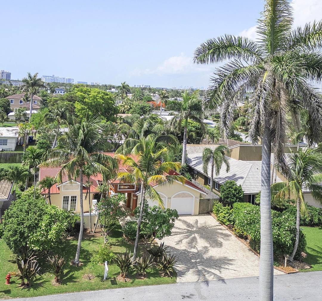 METICULOUSLY maintained 4 bedroom 4 bath MOVE IN ready stunning home is located in the prestigious Bel Air neighborhood in Lauderdale by the Sea !