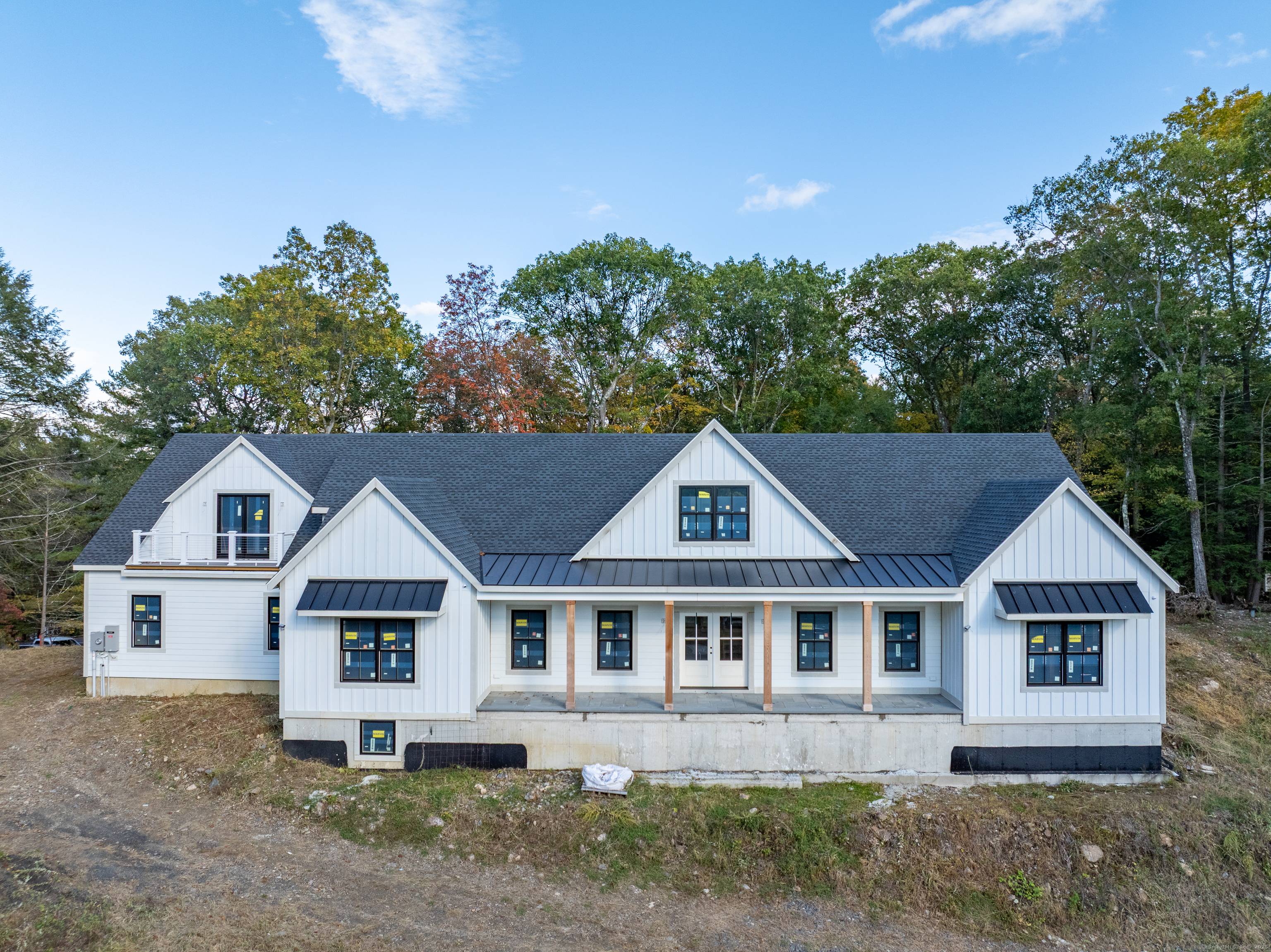 Welcome to 255 Great Plain Road a custom designed residence offering rare opportunity and refined potential.