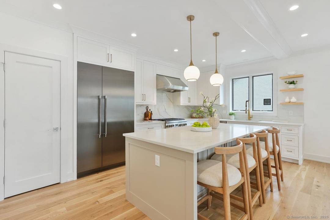 Approximately 4, 000 square feet townhouse feels like a single family home with thoughtfully designed living space and featuring four bedrooms, four en suite bathrooms, and two half baths, and ...