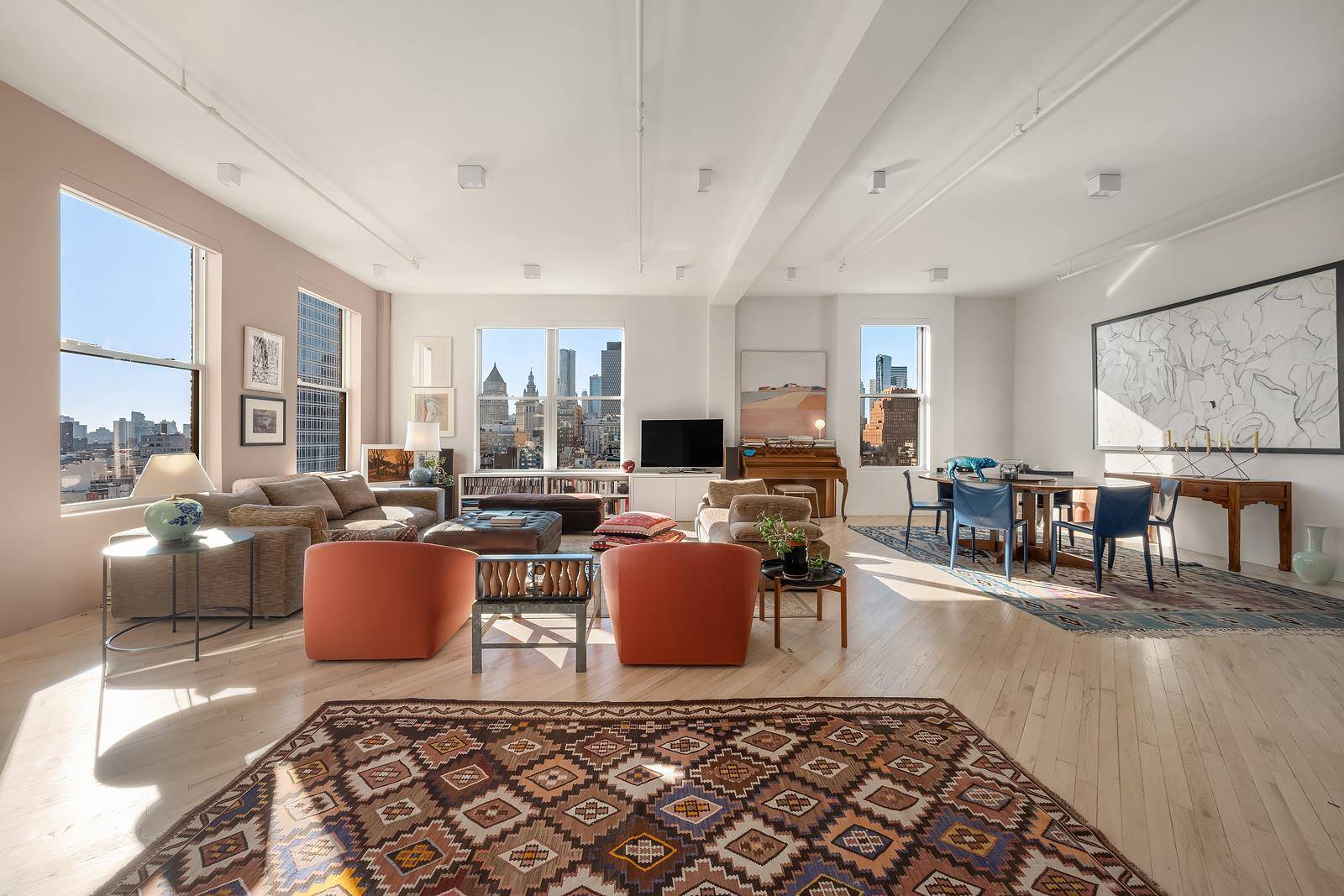 The Top of SoHo. This sun flooded massive one Bedroom plus Nursery or Office loft with soaring ceilings is perched high above any of its piers and offers a massive ...