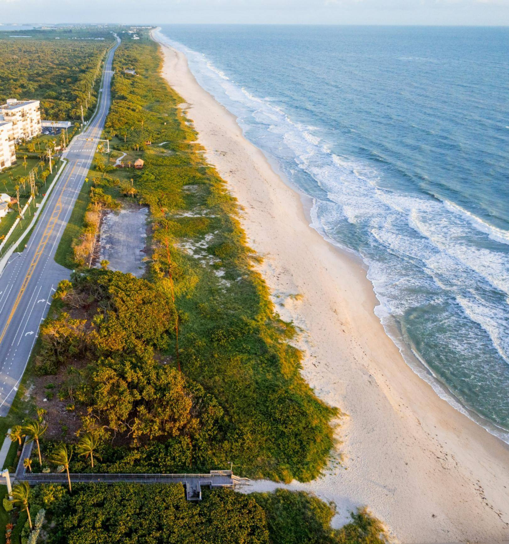 One of 5 direct oceanfront lots available for sale, this 135' wide lot presents an incredible opportunity to capitalize on panoramic views of the coastline, sea, endless open sky.