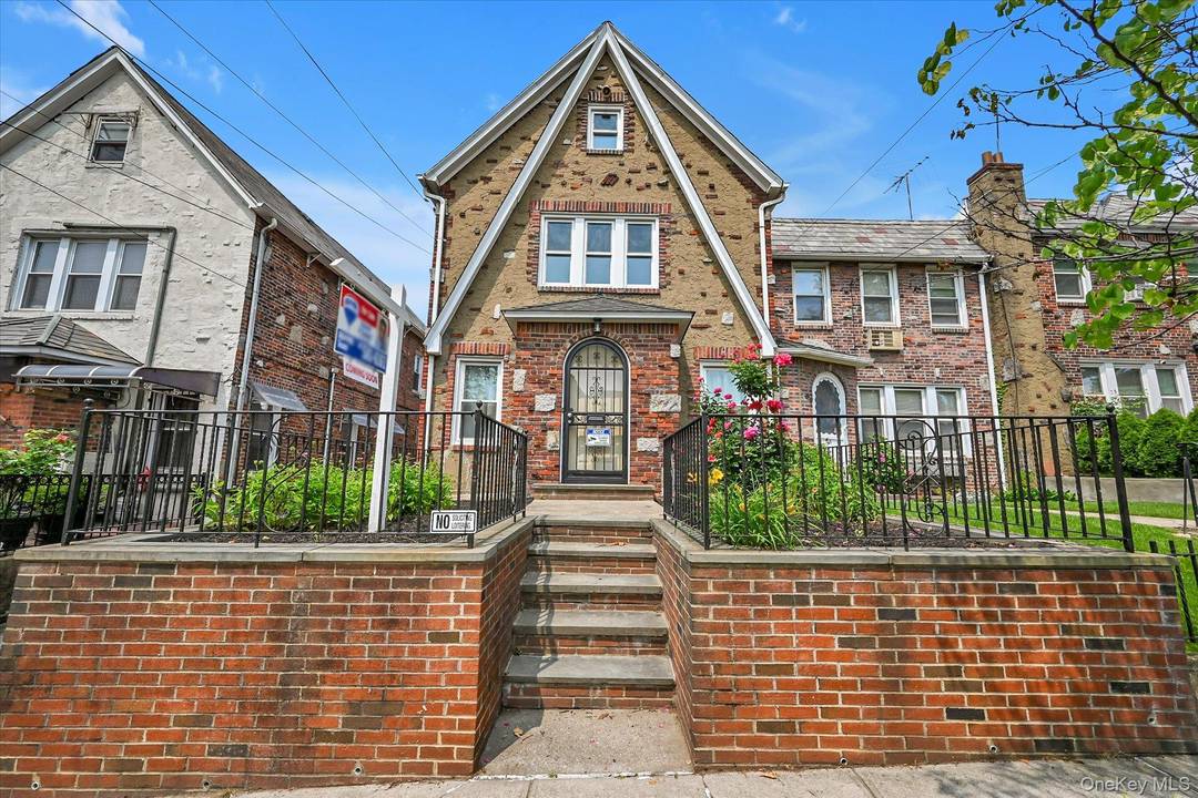 Welcome to this spacious and well maintained two family brick home, complete with driveway and garage.