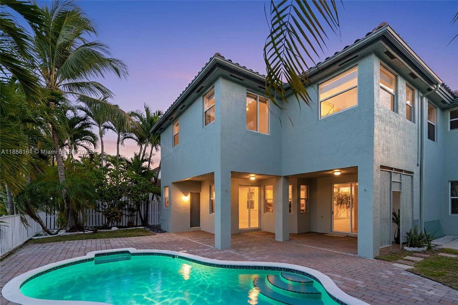 Discover lakeside living at its finest in Crestview Lakes, West Kendall.