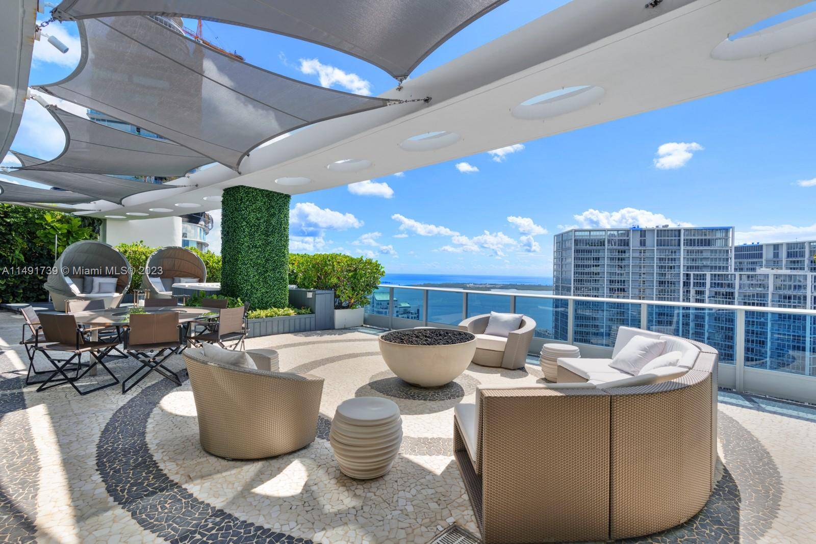Located on the 54th floor of the Epic Residences in Downtown Miami, this completely custom 2 story Penthouse offers breathtaking South East views of the bay and Brickell s city ...
