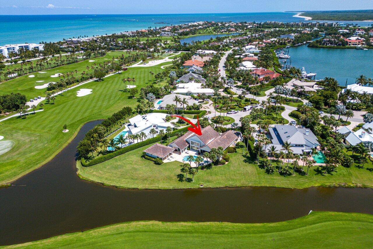 This stunning home situated in a peaceful cul de sac is perfectly designed to capitalize on the breathtaking panoramic views of the golf course and lake.