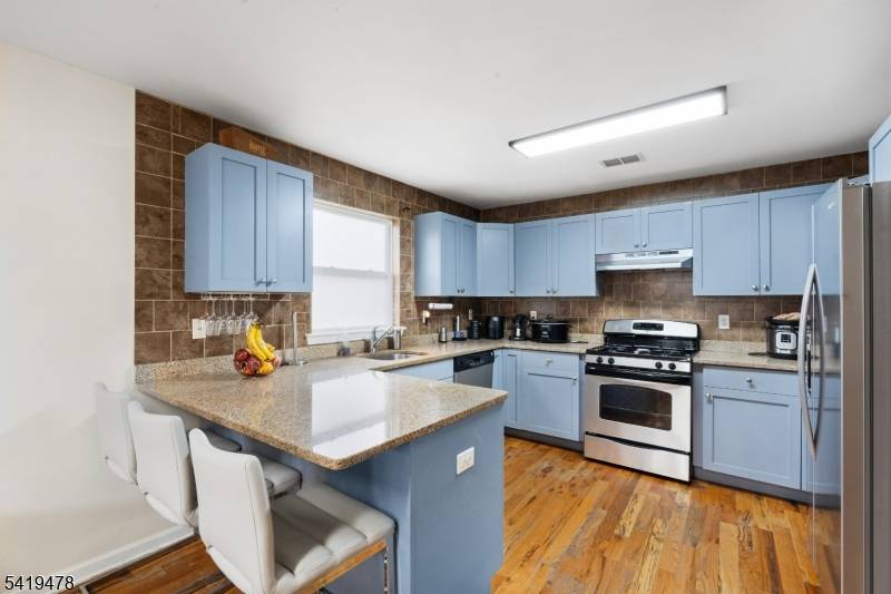 WOW ! Exceptional Custom Built Multifamily in Elmora Kean University Area of ElizabethThis stunning, custom built home offers the perfect blend of space, design, and functionality.