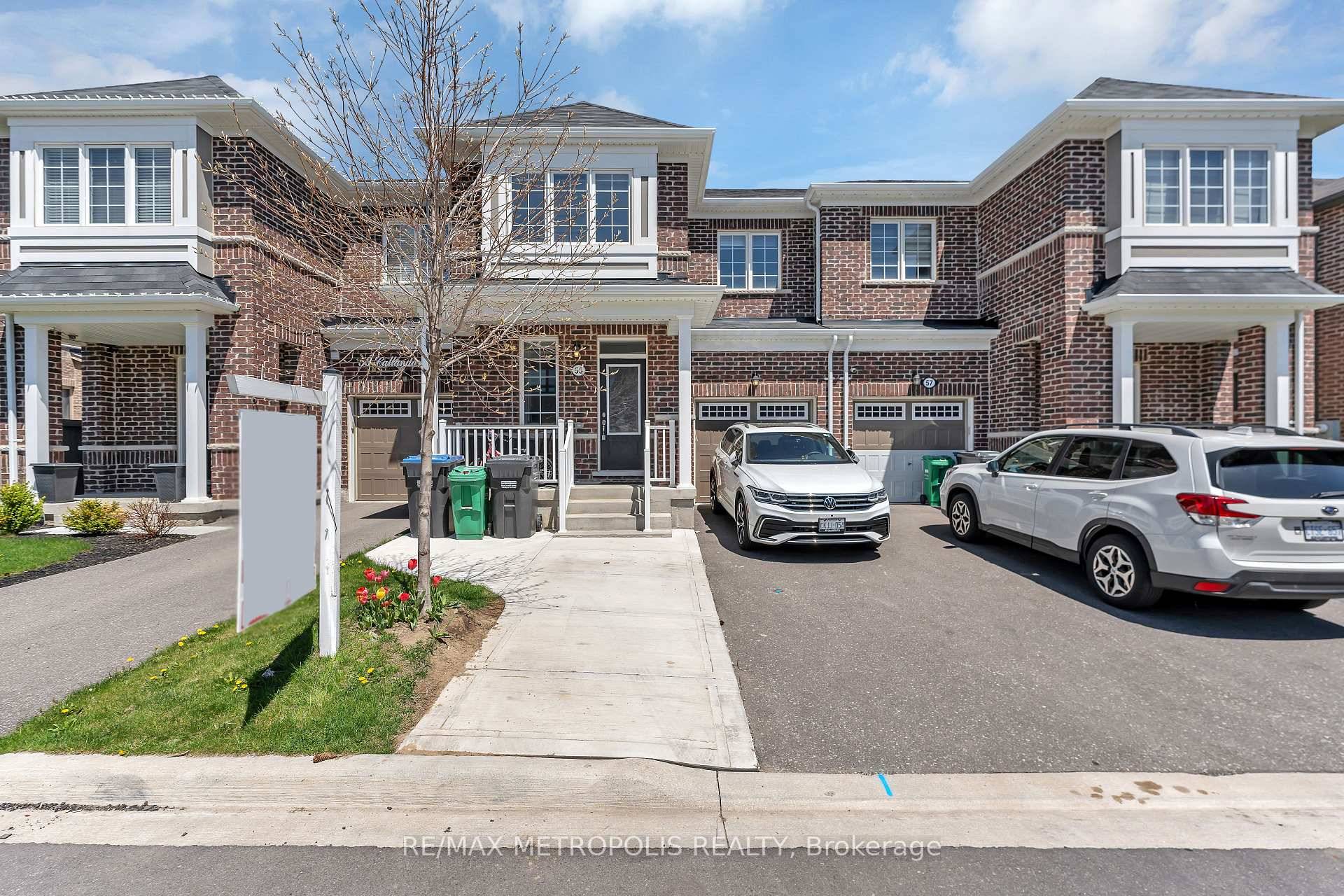 Spacious Freehold Townhome with Finished 2 Bedroom Basement !