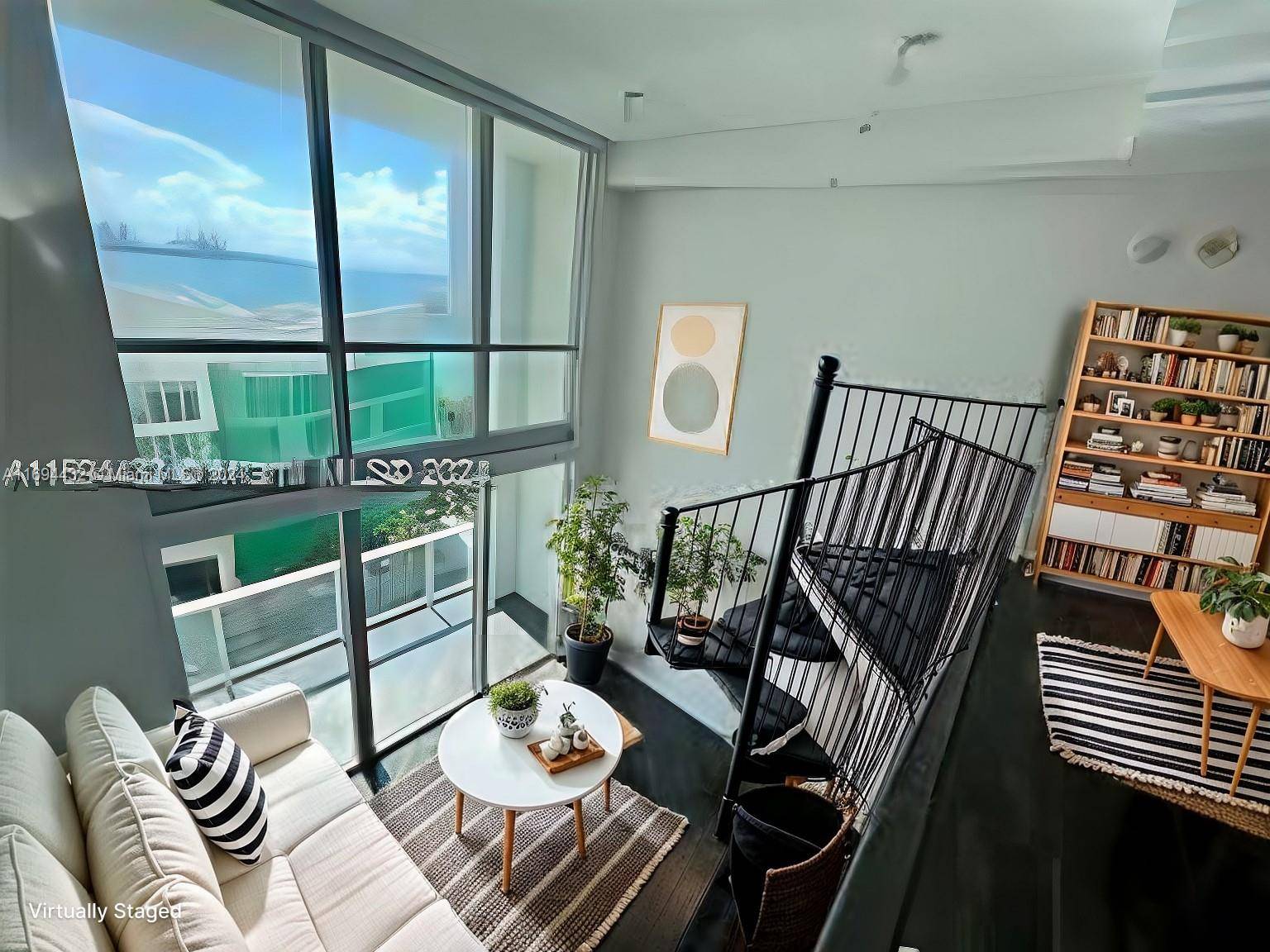 Price adjustment ! Amazing bay views from this 2 story Loft with East exposure.
