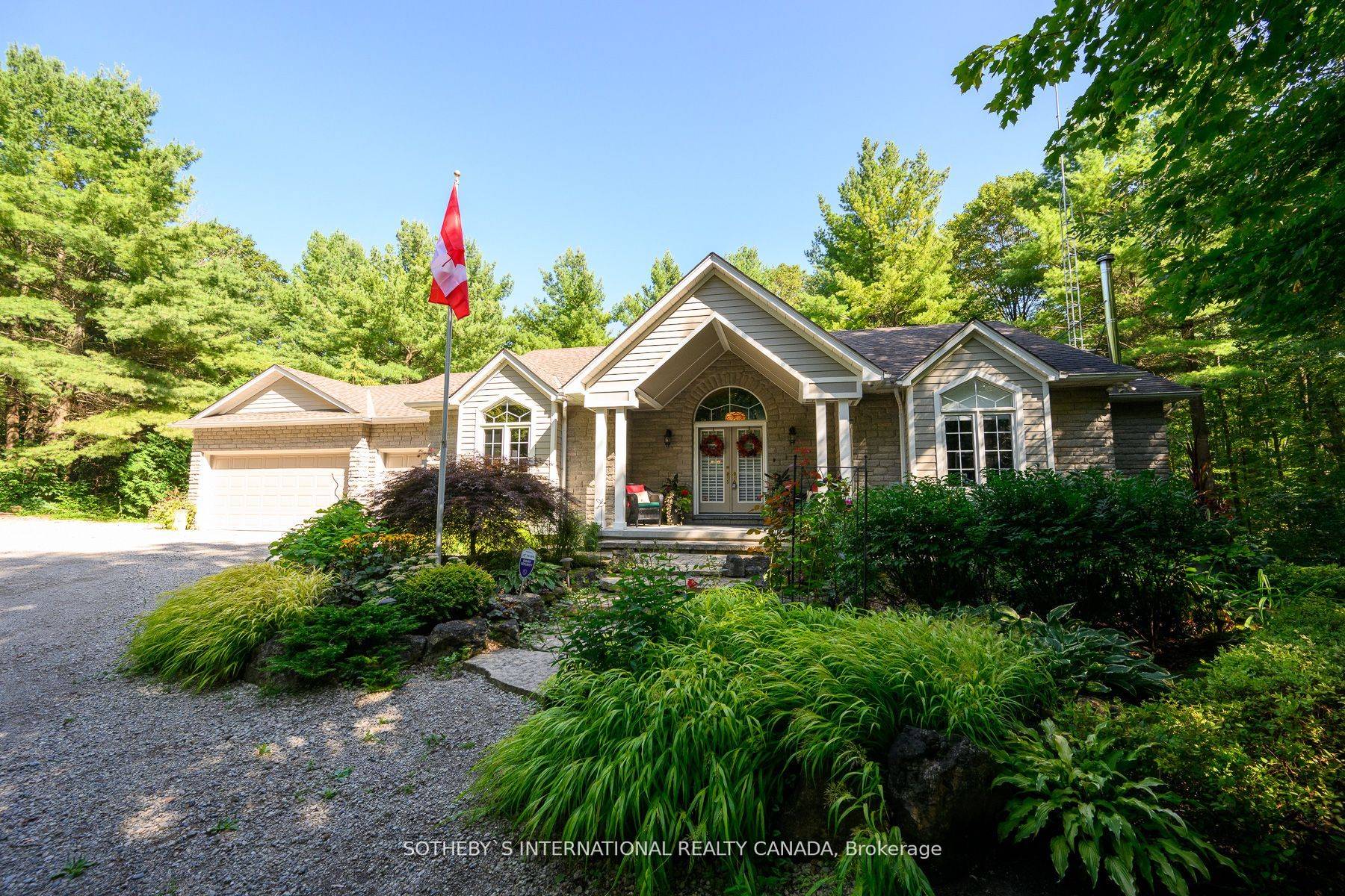 This custom bungalow sits on 5.