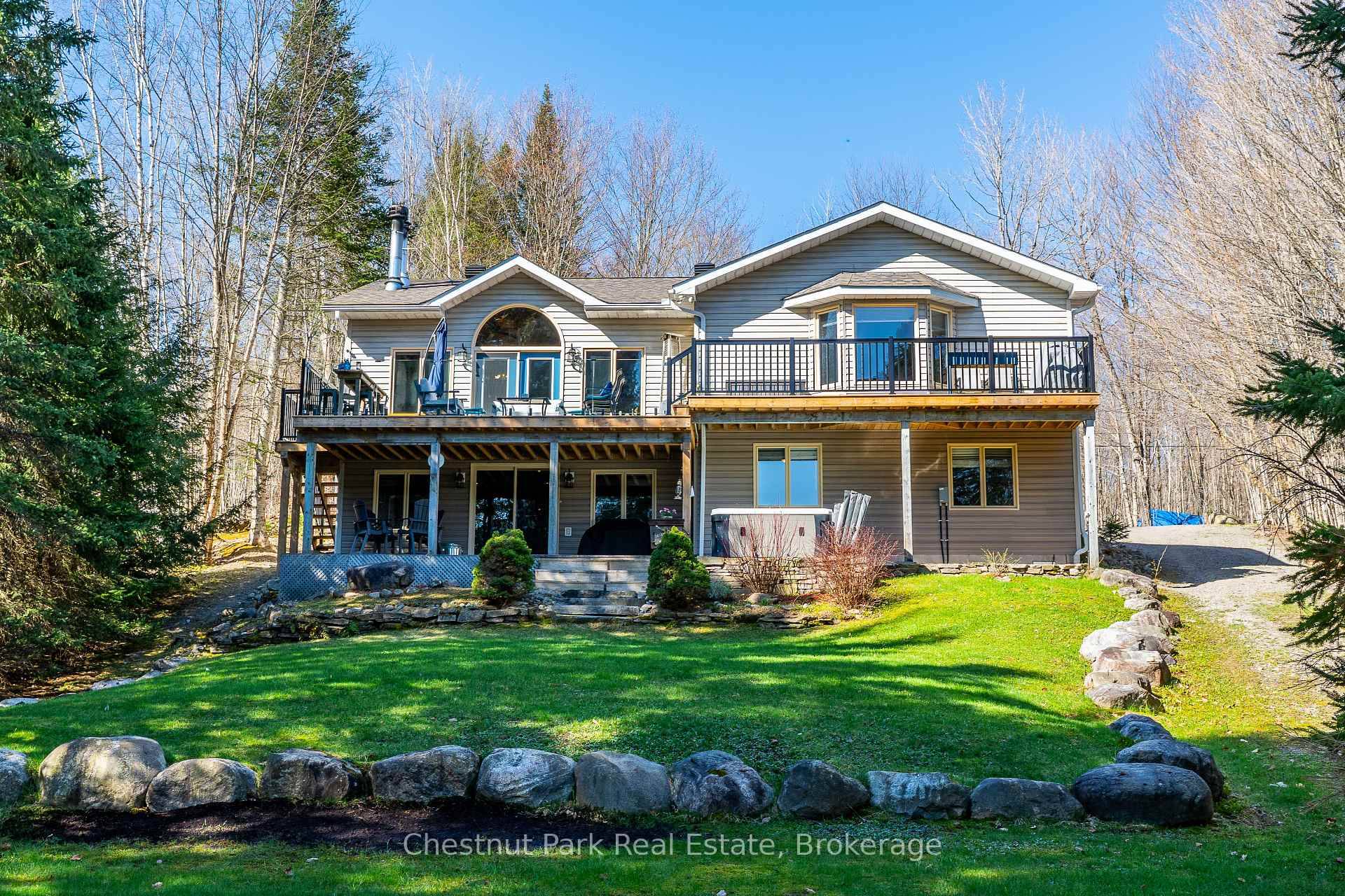 Stunning Waterfront Retreat on Coveted Little Redstone Lake !