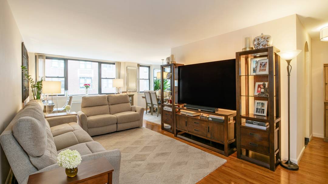 Sellers are Re Locating. Corner unit, approximately 1400 square feet, with sunny East amp ; North exposures.