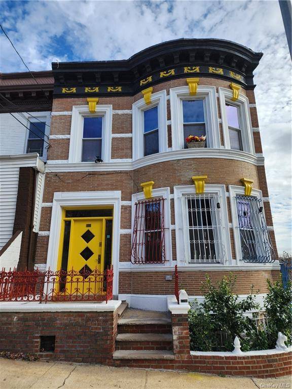 Beautifull spacious two family Brownstone with updates nestled within a culdesac.