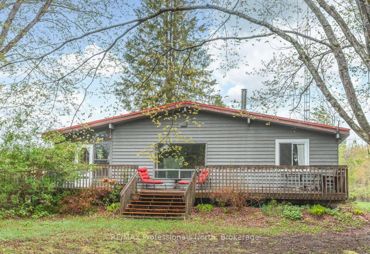 Step into a new lifestyle with this well loved, rustic 2 bedroom, 1 bathroom cottage or four season home, perfectly situated on the tranquil shores of Gull River.