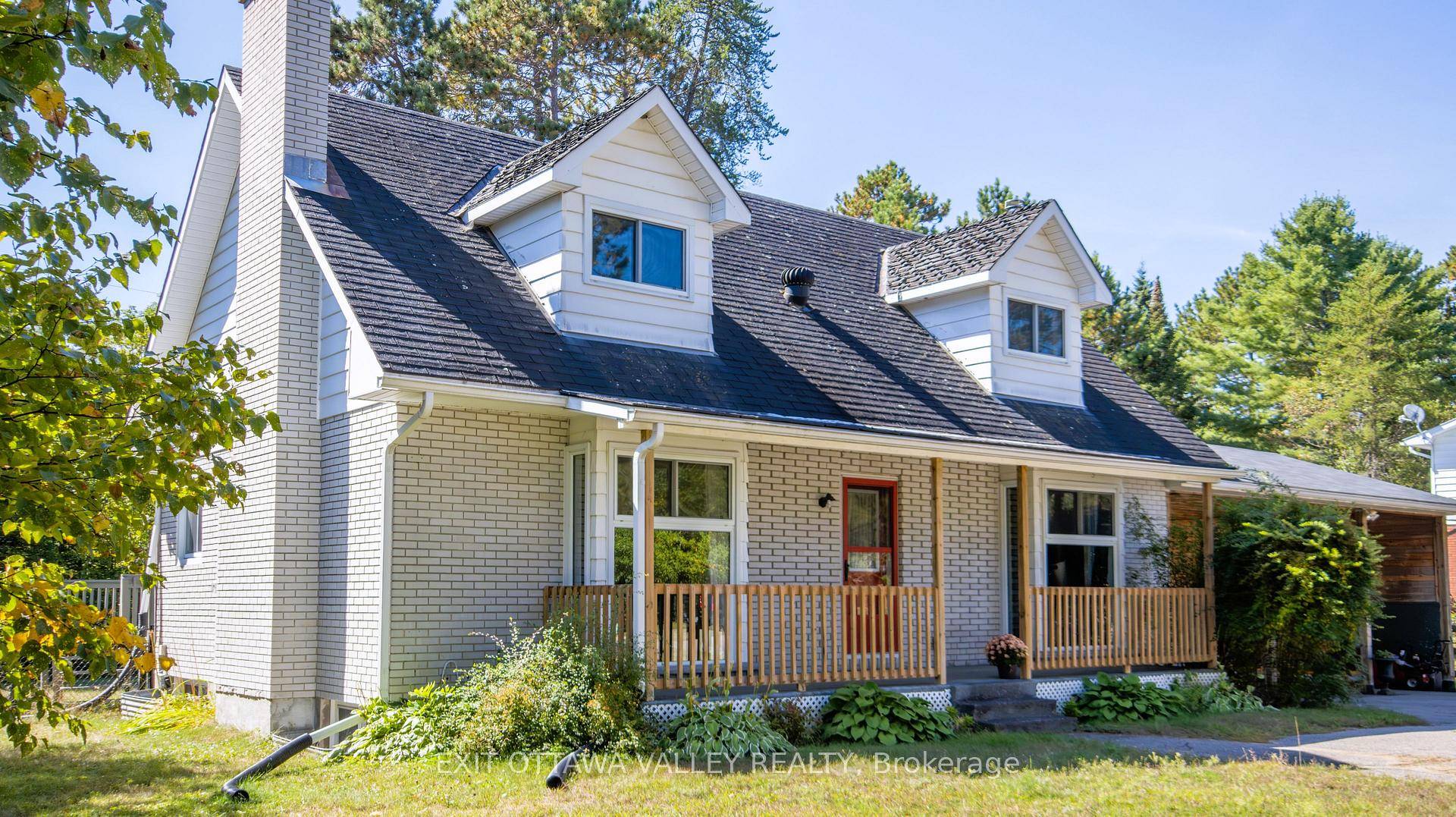 Welcome to this spacious brick family home, set on a beautifully landscaped one third acre lot in a well established neighborhood.