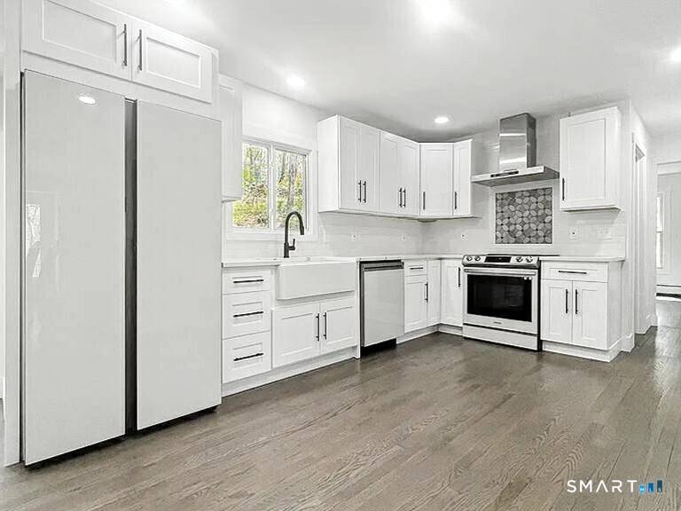 Welcome to this totally remodeled Dutch Colonial in the heart of Fairfield County.