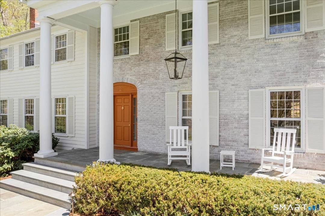 Privately set at the end of a long drive and elevated to capture tranquil reservoir views, this more than 5, 500 square foot Colonial offers a rare sense of serenity ...