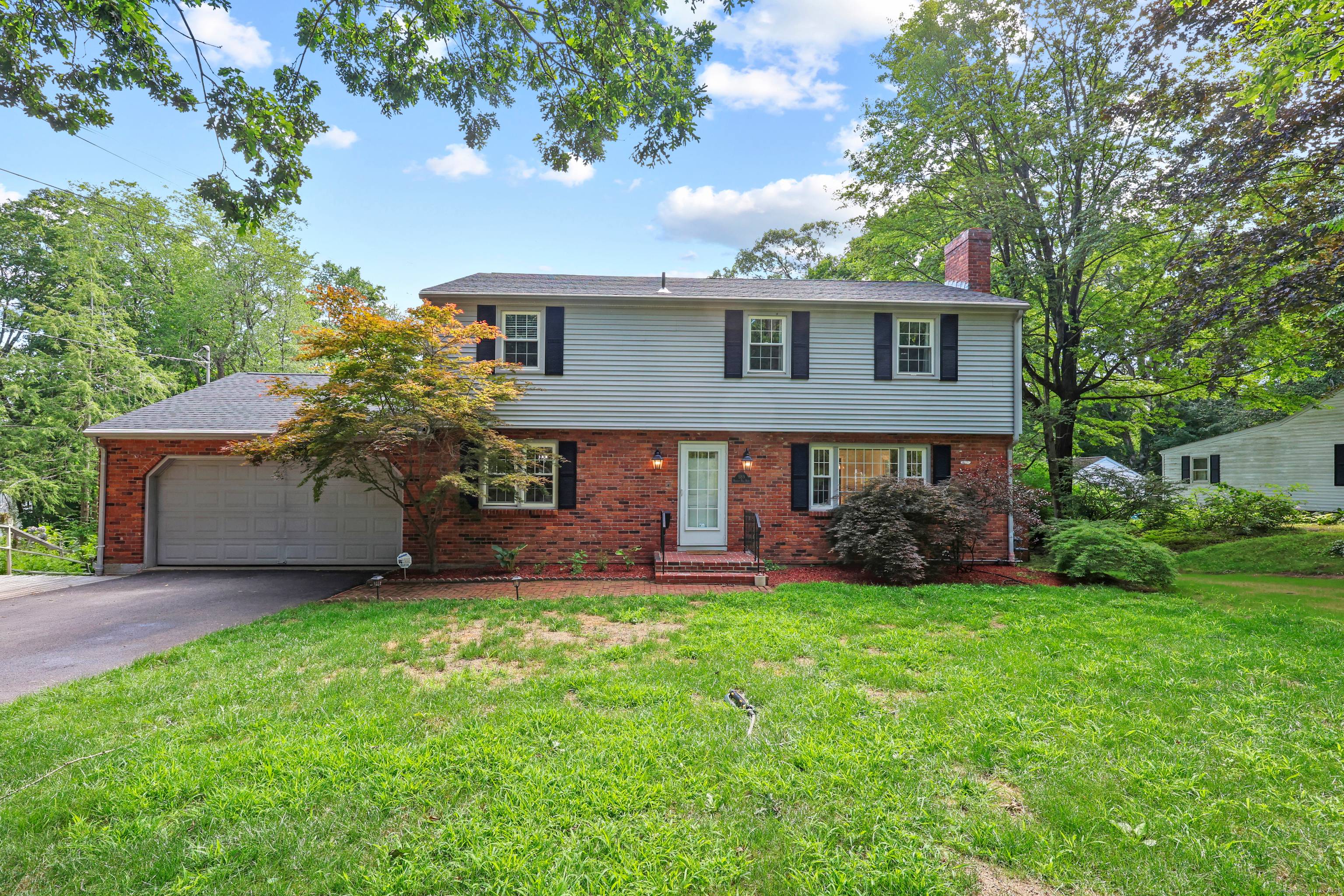Nestled in New Britain's peaceful West End, this fully updated home blends classic charm with modern ease.