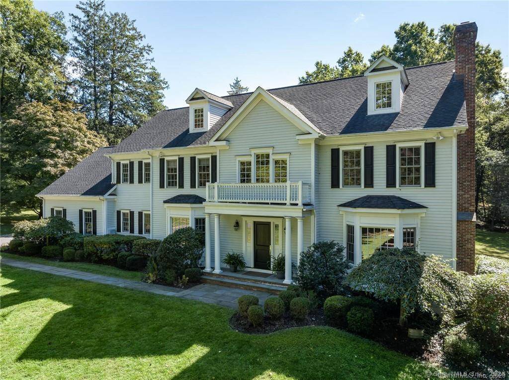 Perfectly situated on over two flat, beautifully usable acres, this exceptional 5 bedroom, 4 full 2 half bath home offers nearly 8, 000 square feet of living space across four ...