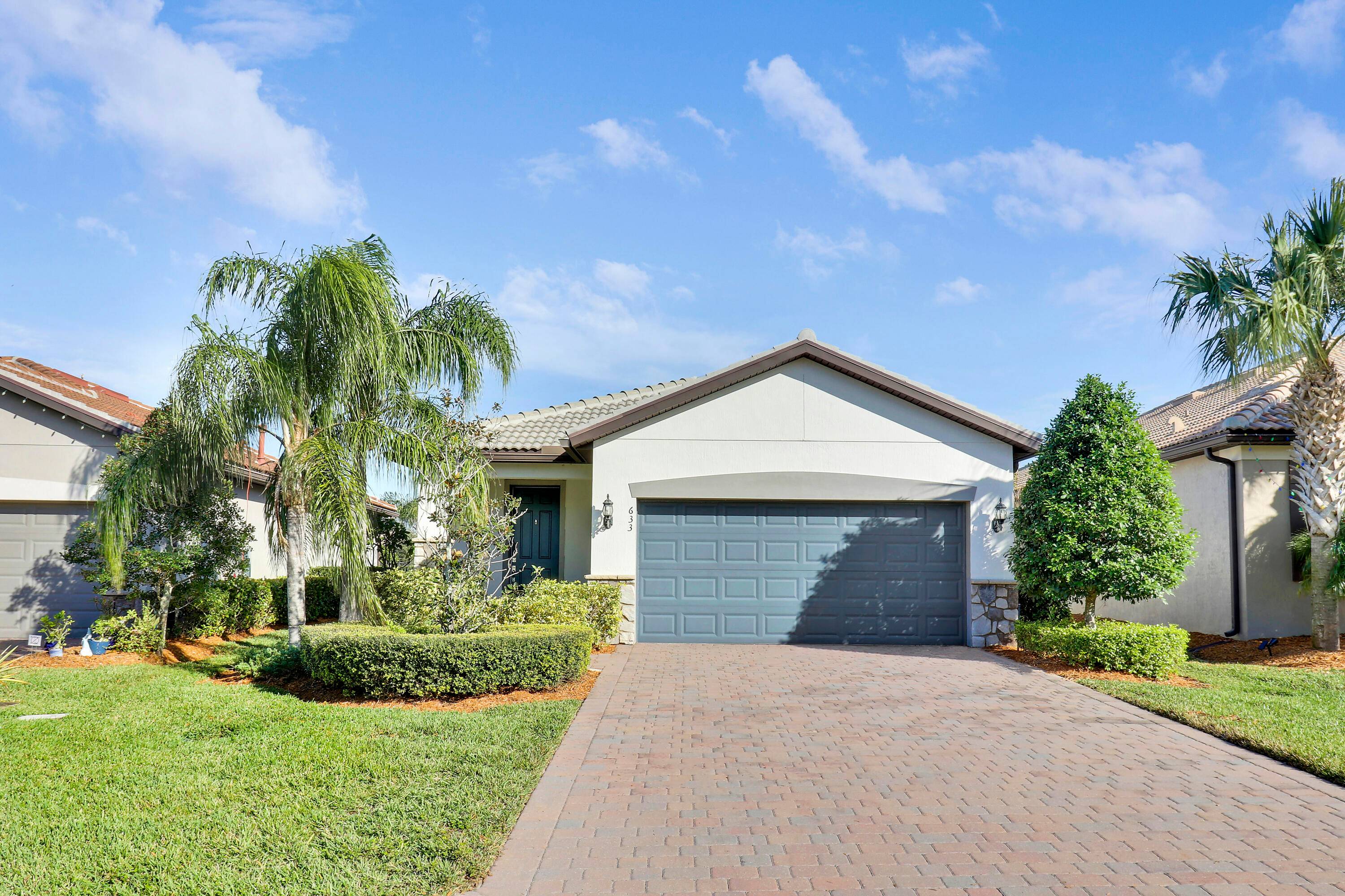 Beautiful 3 bedroom, 2 bath, plus an office, 2 car garage lakefront home located in the popular gated community of Veranda Gardens !