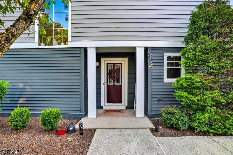 Step into this beautifully maintained North East facing end unit townhome located in the sought after Crossroads community of Bridgewater.