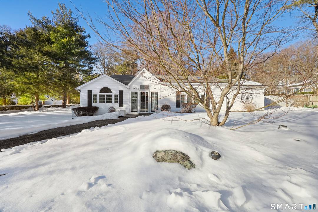 Private country cottage in the sought after Westover neighborhood, set on a level property with exceptional privacy and mature landscaping.