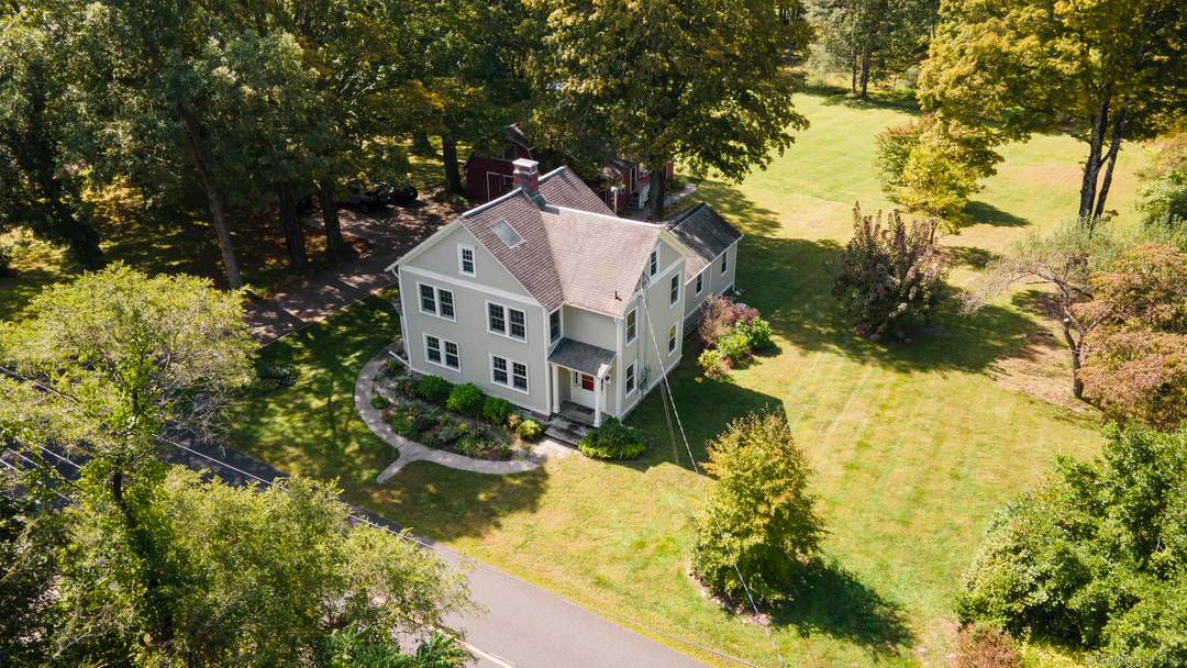 A colonial antique home on a level scenic lot in sought after Litchfield County.