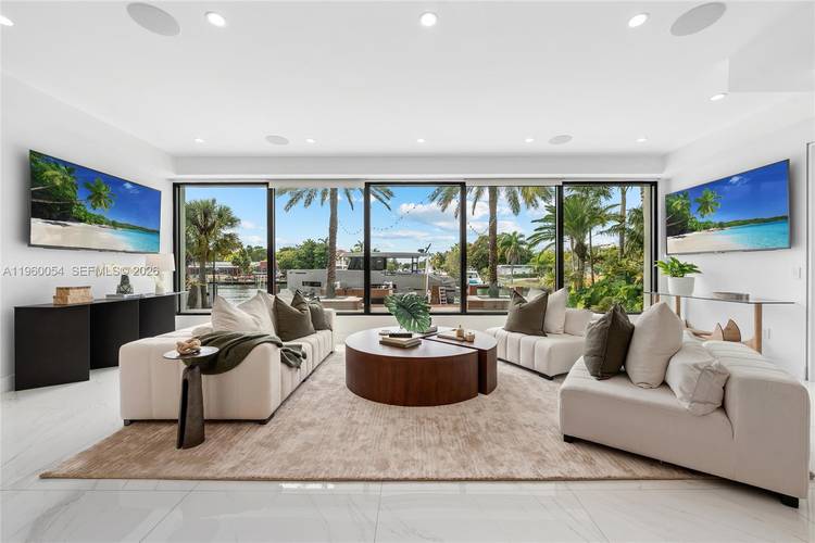 This exceptional waterfront residence is where modern design, thoughtful scale, and a truly rare view come together.