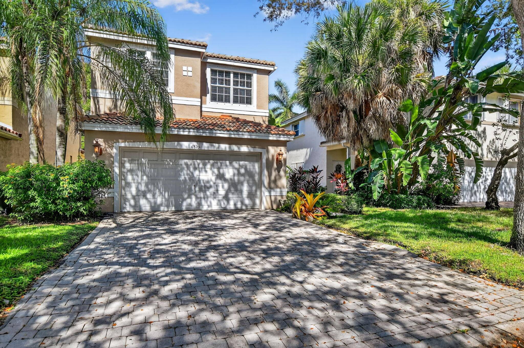 Discover your slice of paradise in this 3 bedroom, 2 1 2 bathroom home located in the desirable CocoBay community in Coconut Creek.