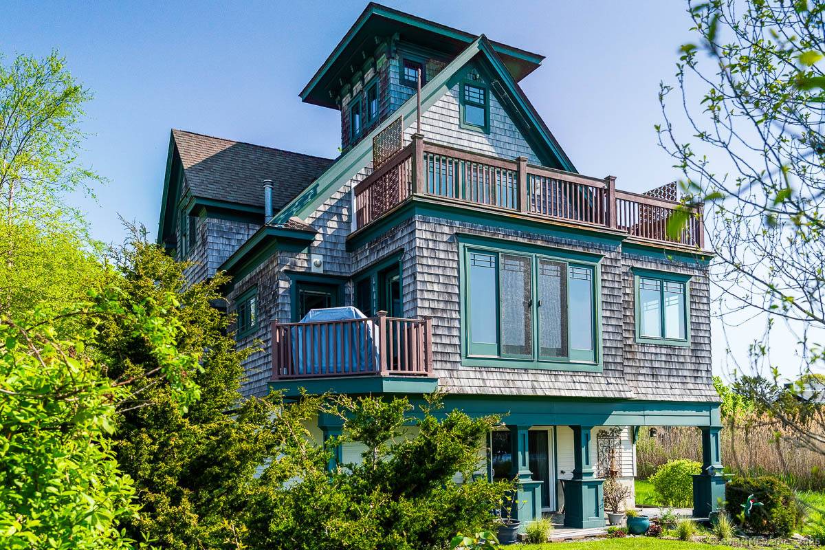 Waterfront oasis on the Connecticut shoreline with private 65 foot dock and custom built home within the sought after Shennecossett community.